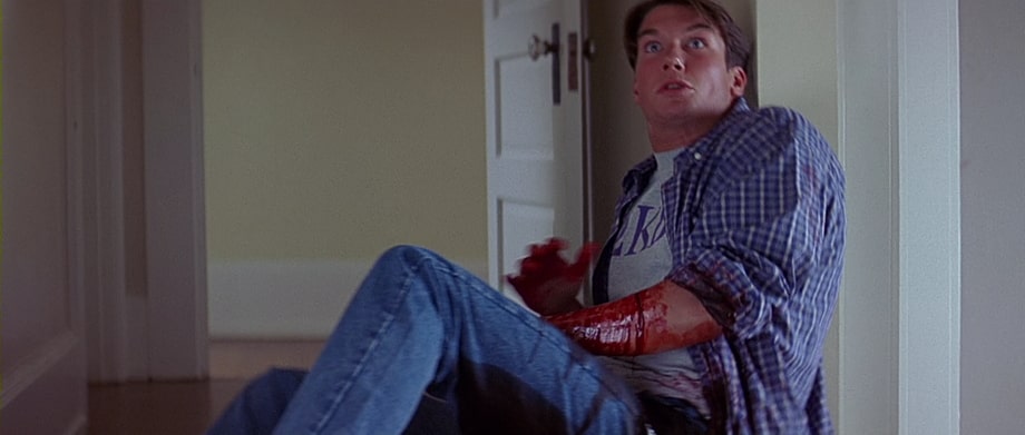 Derek is being wounded by the ghostface