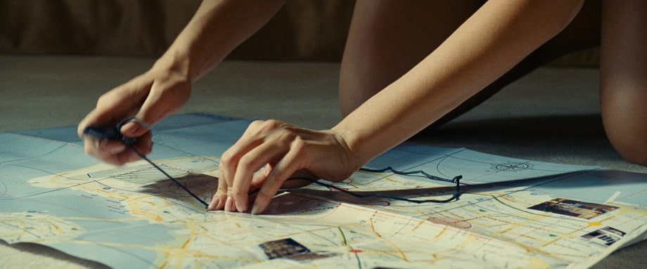 Kim uses a map of Istanbul